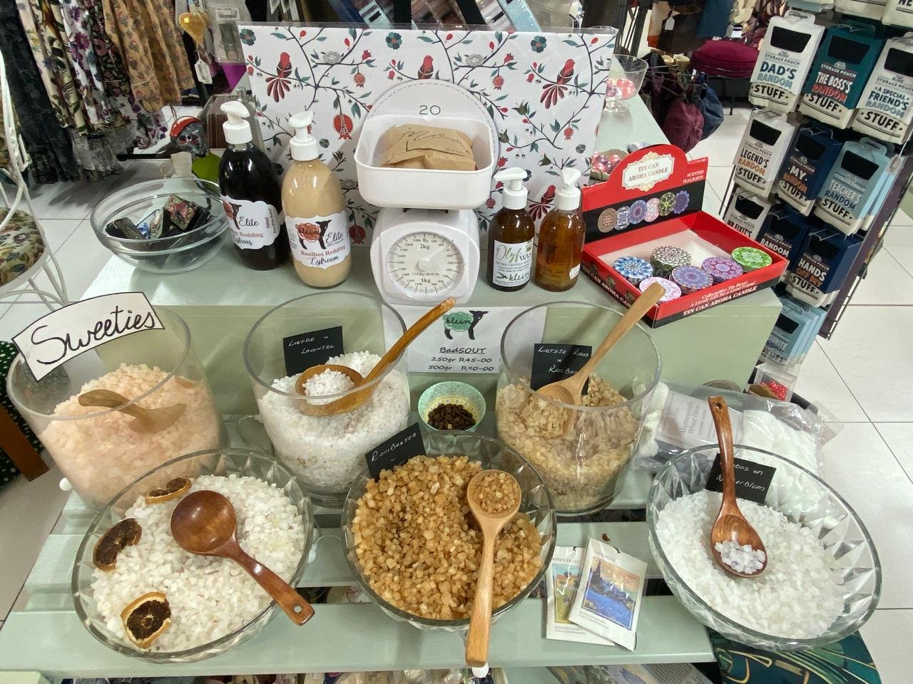 The bath salts bar with glass bowls, wooden scoops and a kitchen scale